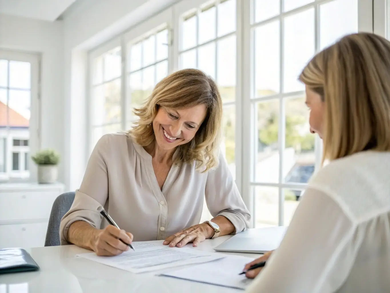 A friendly notary public interacting with a satisfied client, highlighting the personalized and customer-focused approach of SOS Notary.